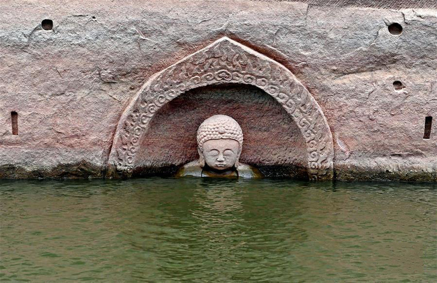 江西南城一水库发现摩崖造像“佛头”遗迹浮出水面